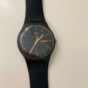 Swatch Black and Orange Wearable Watch